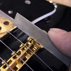 Gauged Nut Slotting Files - StewMac -Fine Musical Instruments 0821 3 inuse saddle