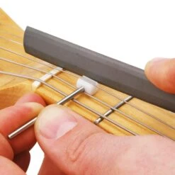String Lifter - StewMac 5 String Lifter - StewMac -Fine Musical Instruments 4803 2 in use 1750px
