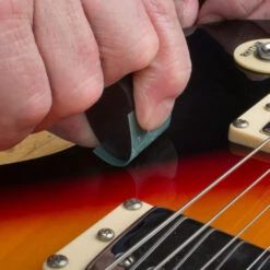 Kovax Tolecut Finish Repair System - StewMac -Fine Musical Instruments 5733 5 inuse on archtop curve 2000