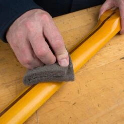 3M Scotch-Brite Pads - StewMac -Fine Musical Instruments 7445 3 inuse neck gry 3000px